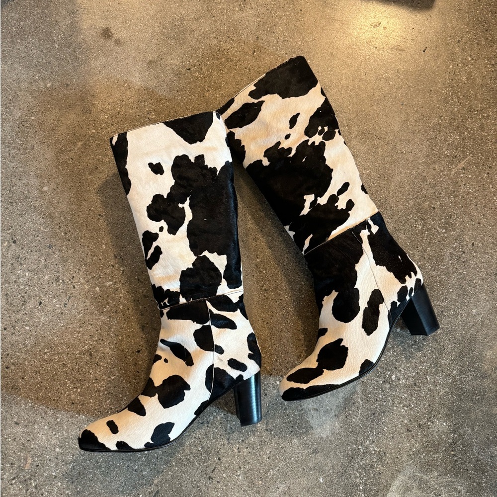 INTENTIONALLY BLANK COW PRINT TALL KNEE HIGH BOOTS. NWOT
